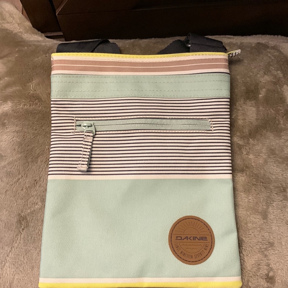 New never used Dakine crossbody bag.
